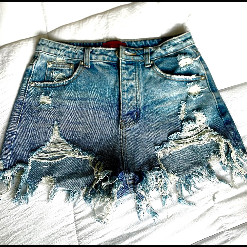 Ripped Blue Jean style shorts